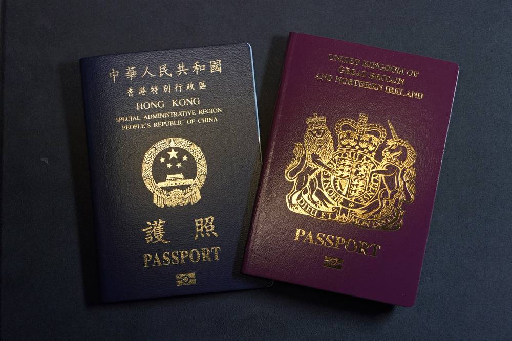 Hong Kong politicians and tycoons pressed to give up foreign passports for NPC seats